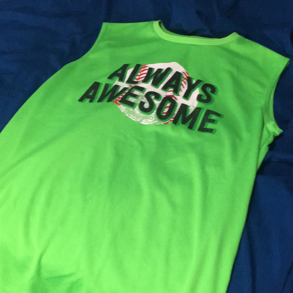 A sleeveless green spirts shirt